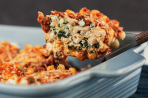 A lifted slice of Tuna Lasagna Rolls