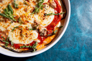 OCEANS MILLIONNAIRES AUTHENTICA EGGPLANT LASAGNA Feature